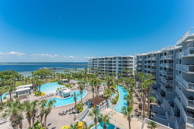 birds eye view of property with a water view