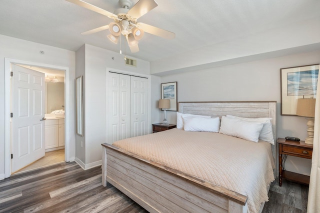 bedroom with hardwood / wood-style floors, ceiling fan, and a closet