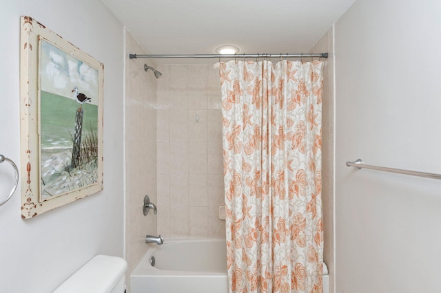 bathroom with toilet and shower / tub combo with curtain