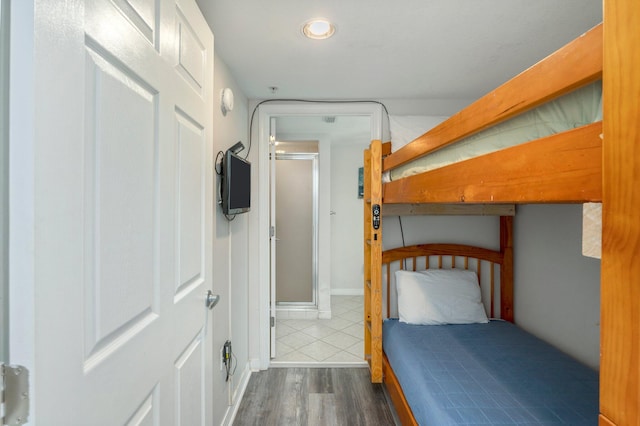 unfurnished bedroom featuring dark hardwood / wood-style floors