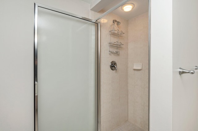 bathroom featuring an enclosed shower