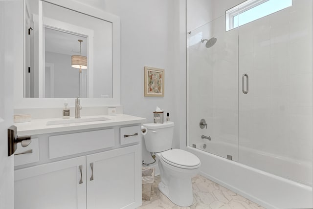 full bathroom featuring vanity, toilet, and enclosed tub / shower combo