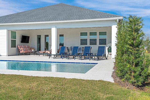 rear view of property featuring a patio