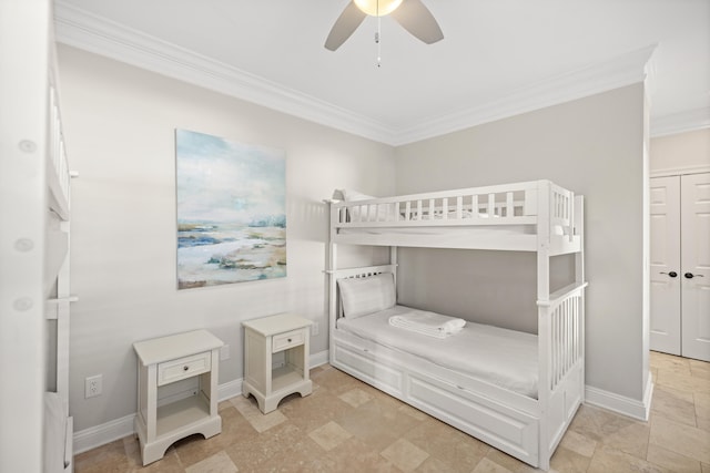 bedroom with ceiling fan, a closet, and crown molding