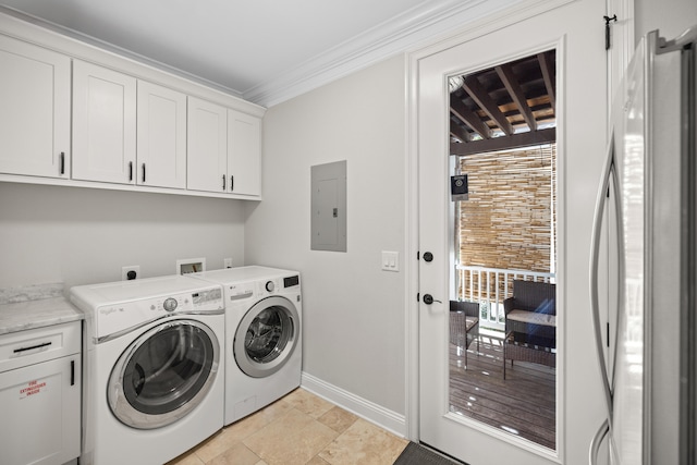 laundry area featuring electric panel, crown molding, cabinets, and separate washer and dryer