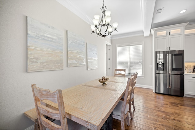 dining room featuring crown molding, beamed ceiling, dark hardwood / wood-style floors, and a notable chandelier