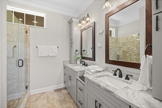 bathroom with vanity, an enclosed shower, and ornamental molding