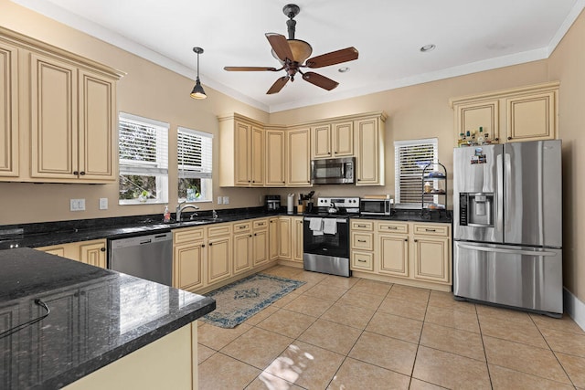 kitchen with ceiling fan, sink, stainless steel appliances, light tile patterned flooring, and ornamental molding