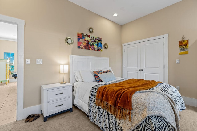 carpeted bedroom with a closet