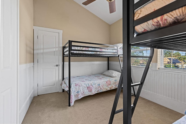 bedroom featuring light carpet and ceiling fan