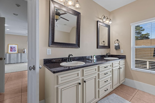 bathroom with vanity, tile patterned floors, and ceiling fan