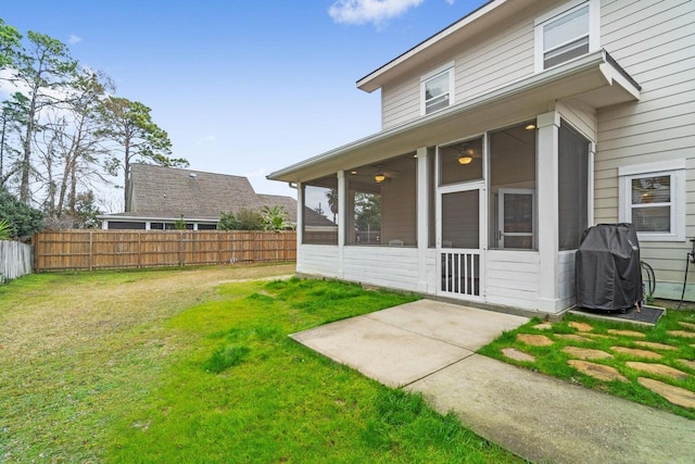 view of yard with a patio area and a sunroom