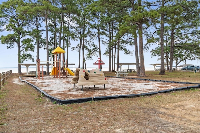 view of playground featuring a water view