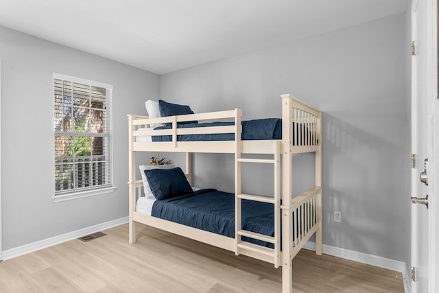 bedroom featuring hardwood / wood-style flooring