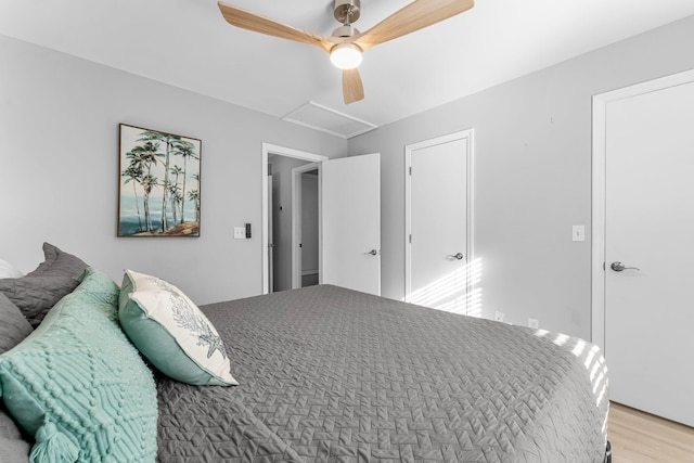 bedroom featuring ceiling fan and light hardwood / wood-style flooring