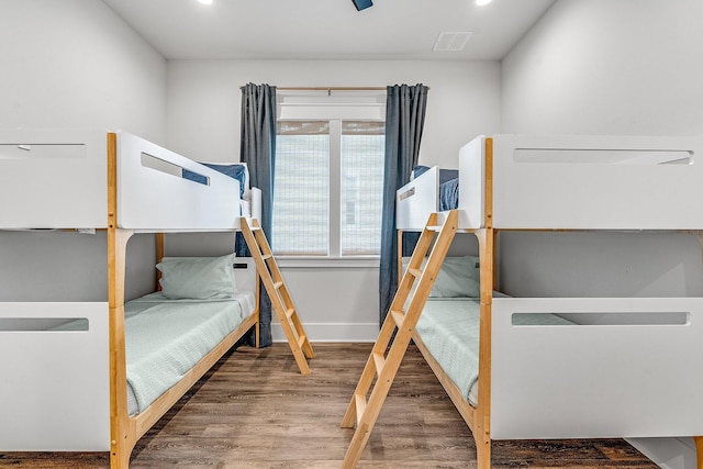 bedroom featuring hardwood / wood-style floors