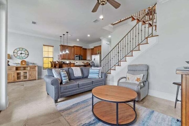 living room with ceiling fan and crown molding