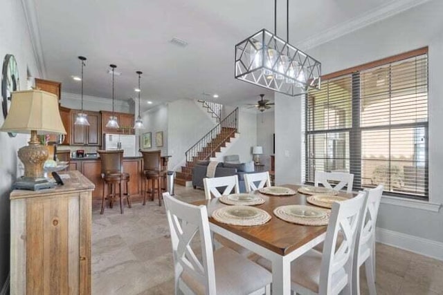 1900 Baytowne Loop, Miramar Beach, FL 32550 - dining area featuring stairs, crown molding, a ceiling fan, and baseboards