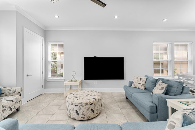 living room with light tile patterned floors and crown molding