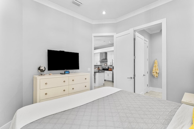 bedroom featuring crown molding