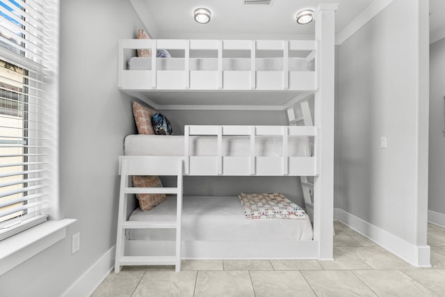 unfurnished bedroom featuring light tile patterned floors