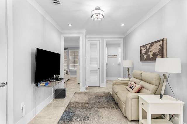 living room featuring light tile patterned floors and crown molding