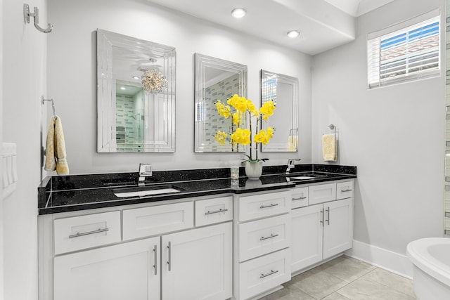 bathroom featuring tile patterned flooring, vanity, and independent shower and bath