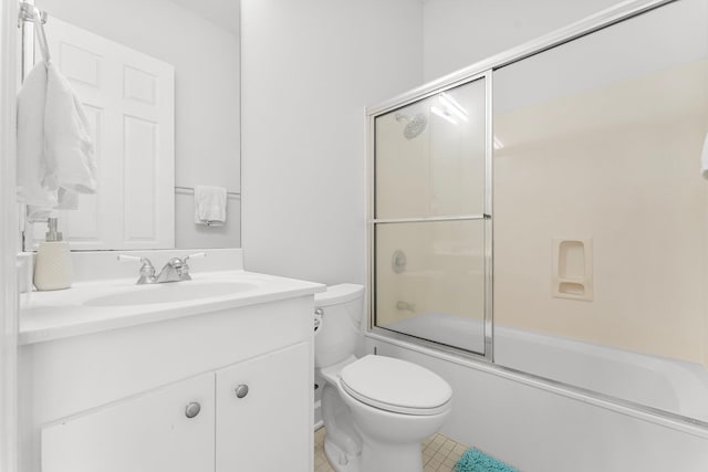 full bathroom with vanity, combined bath / shower with glass door, and toilet