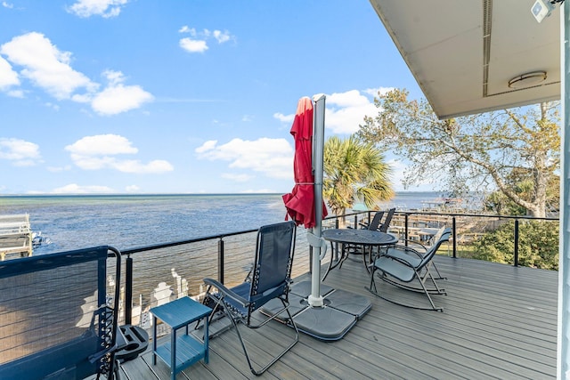 deck featuring a water view