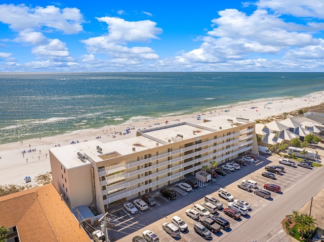 bird's eye view with a beach view and a water view