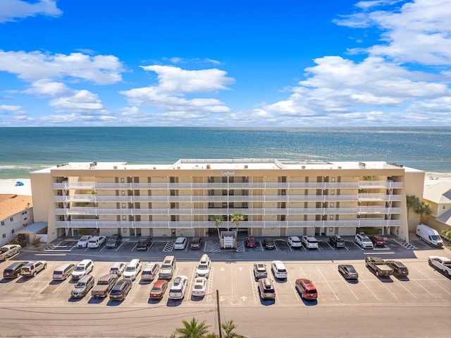 view of building exterior with a water view