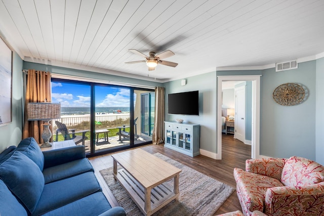 living room with hardwood / wood-style flooring, ceiling fan, and wood ceiling