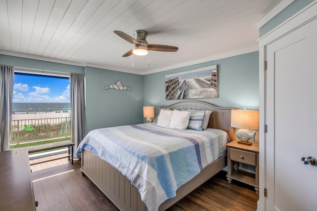 bedroom featuring ceiling fan, dark hardwood / wood-style flooring, and wooden ceiling