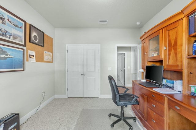 view of carpeted office space