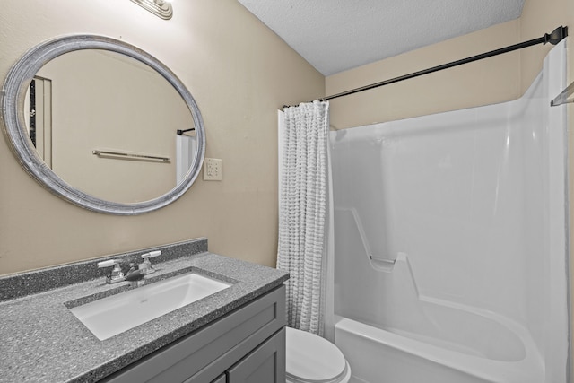 full bathroom featuring vanity, toilet, a textured ceiling, and shower / tub combo with curtain