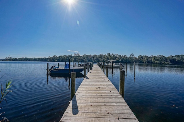 view of dock with a water view