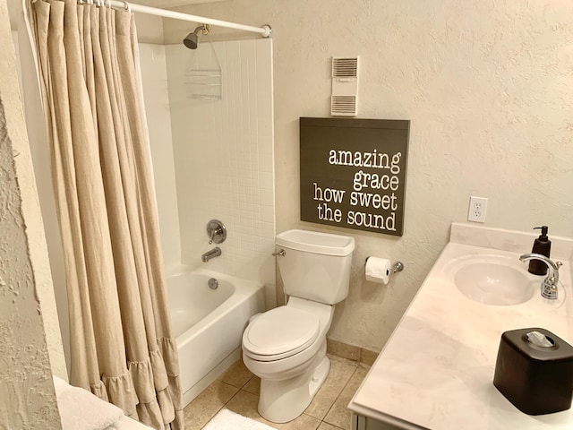 full bathroom featuring toilet, tile patterned flooring, vanity, and shower / tub combo with curtain