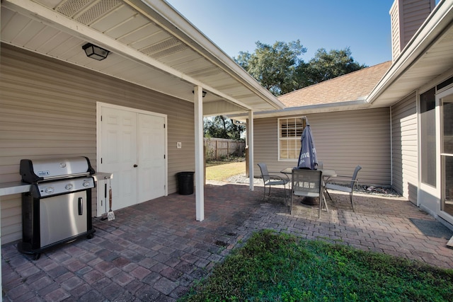 view of patio with a grill