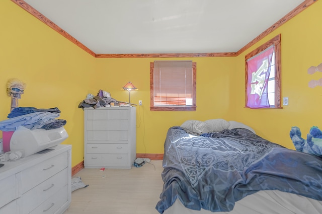 bedroom featuring crown molding