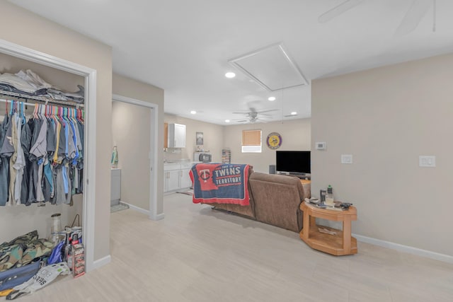 living room with ceiling fan