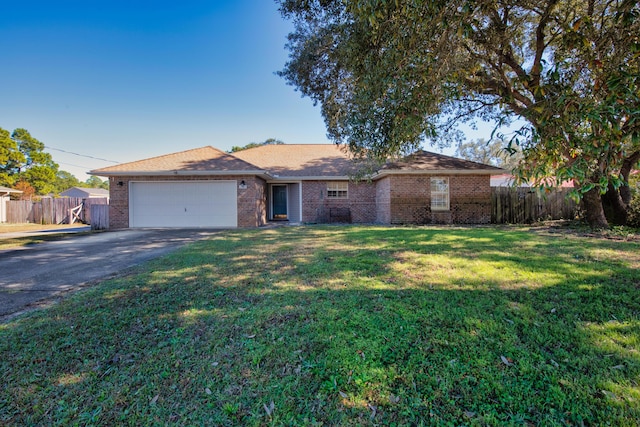 ranch-style house with a front lawn and a garage