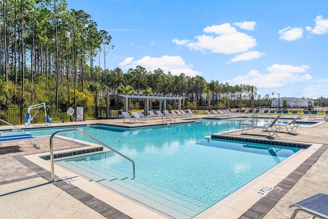 view of pool featuring a patio area