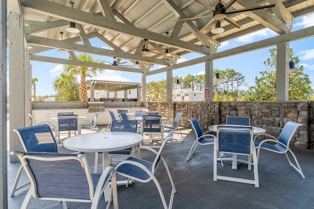 view of patio / terrace with a gazebo and an outdoor kitchen