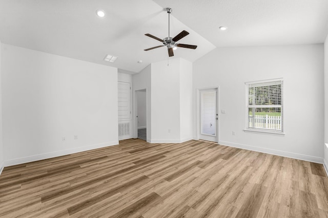 interior space with high vaulted ceiling, light hardwood / wood-style flooring, and ceiling fan