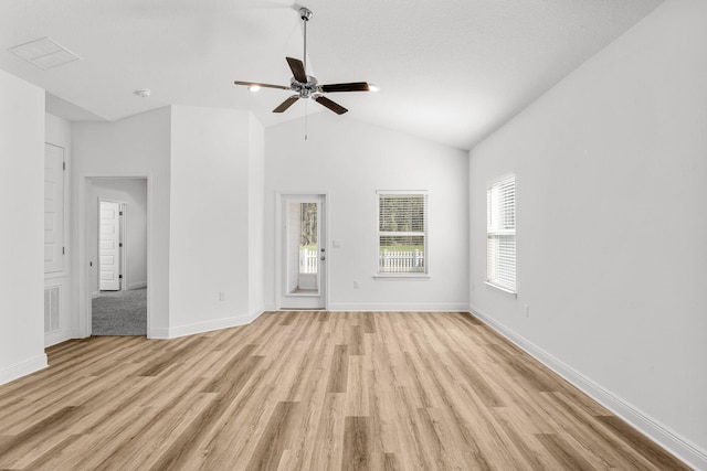 unfurnished living room featuring light hardwood / wood-style floors, high vaulted ceiling, and ceiling fan