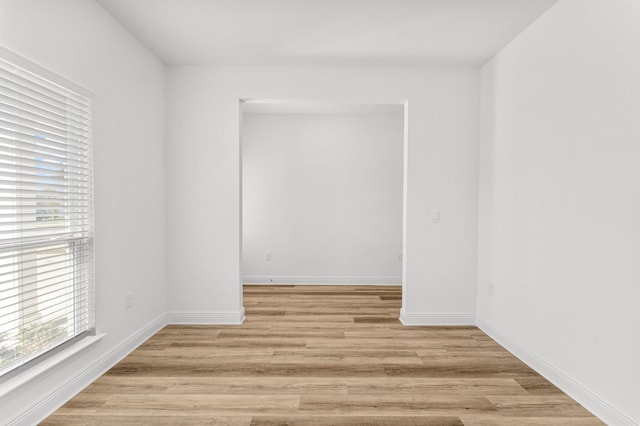 spare room with light wood-type flooring