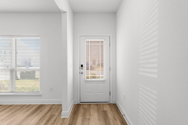 doorway featuring light hardwood / wood-style floors