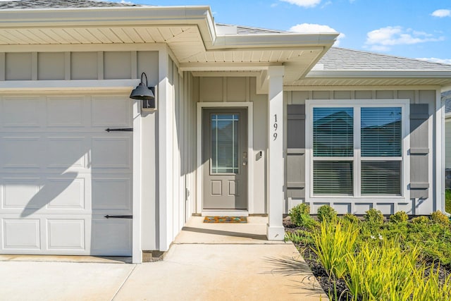 entrance to property featuring a garage