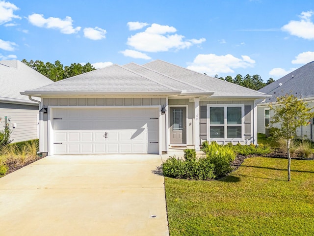 single story home with a front lawn and a garage