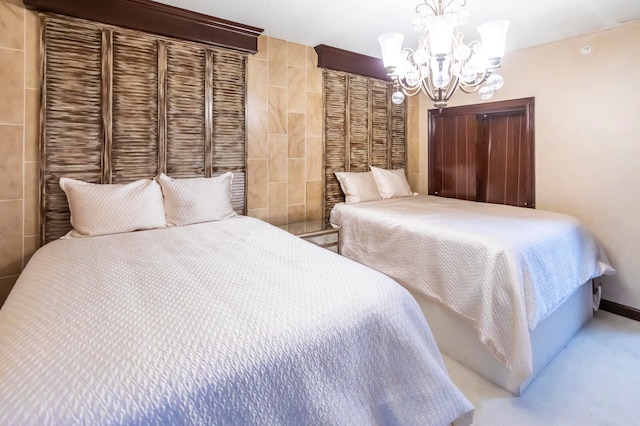 bedroom with a chandelier